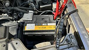 Jumpstarted 1989 240 positive red cable on the negative terminal-img_0563.jpeg